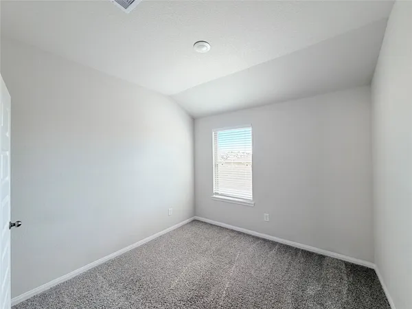 an empty room with window