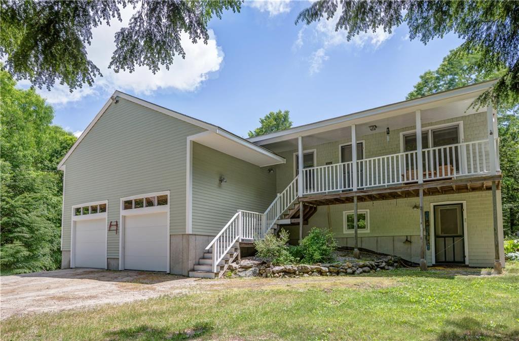 Exterior front with covered porch...