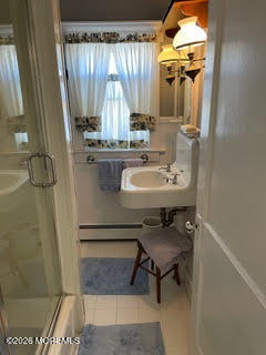 214 Howe Street Point Pleasant, NJ 08742 - Photo 15 of 16 a bathroom with a sink toilet and shower