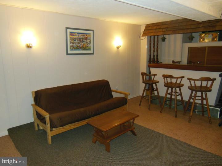 241 Richfield Road Upper Darby, PA 19082 - Photo 24 of 24 a living room with furniture and a flat screen tv