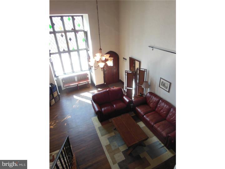 241 Richfield Road Upper Darby, PA 19082 - Photo 10 of 24 a living room with furniture and a window