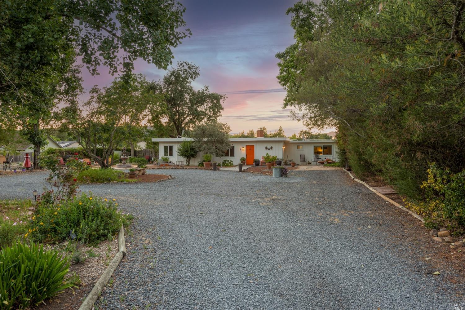 471 Benjamins Road Santa Rosa, CA 95409 - Photo 1 of 1 a view of a street with cars parked on the road