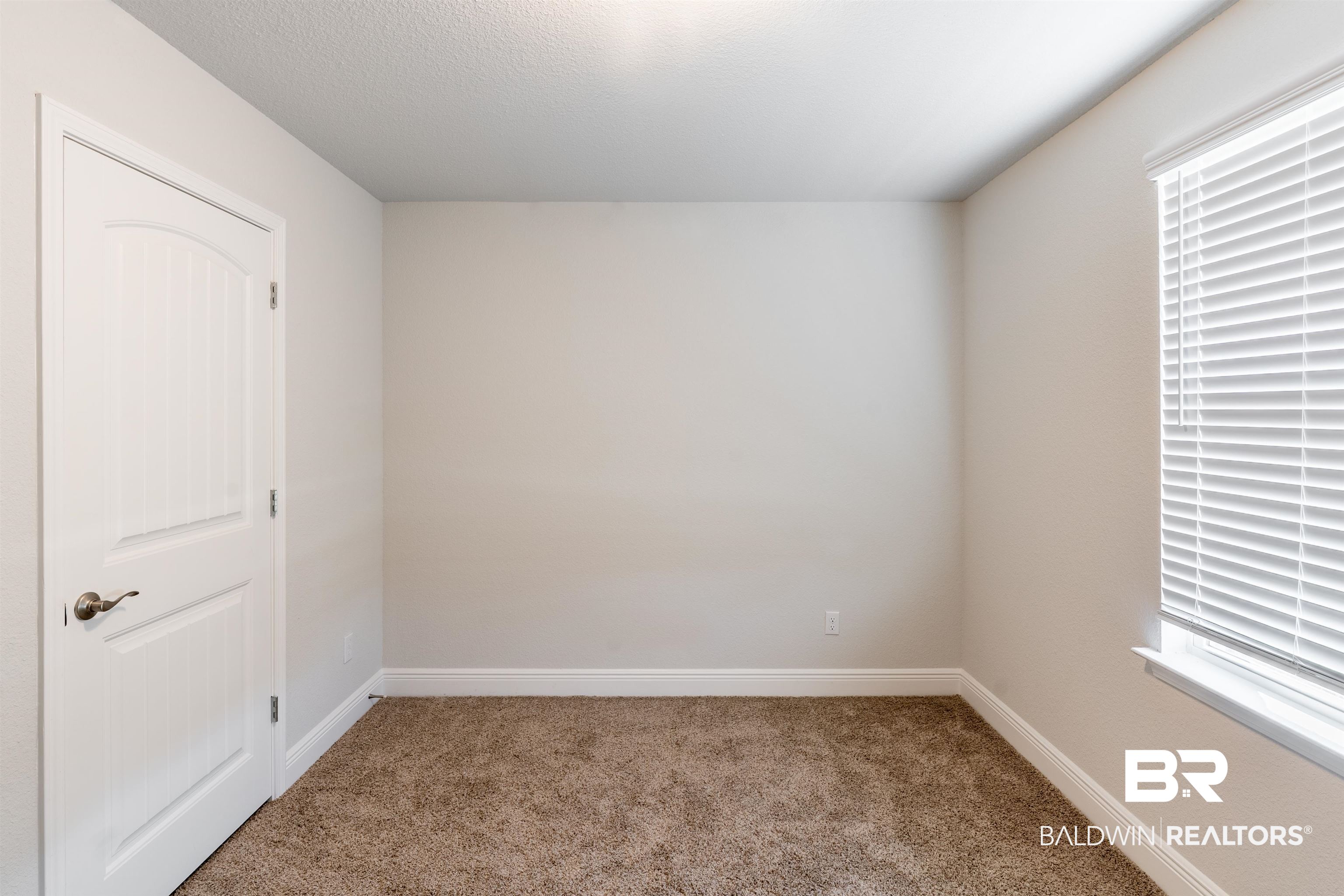 1906 Stonepine Drive South Semmes, AL 36575 - Photo 20 of 30 Spare room with baseboards and carpet flooring