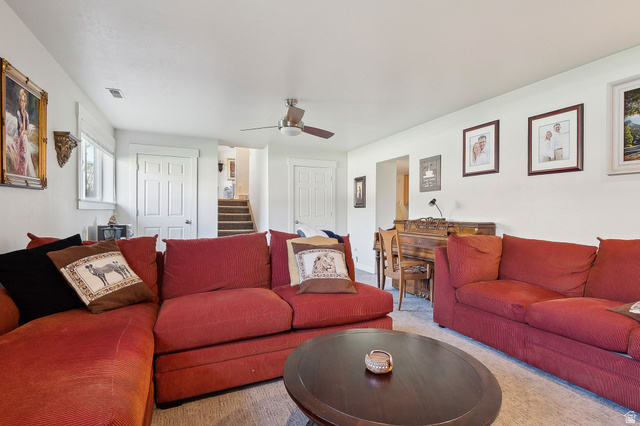 550 Pine Canyon Road Midway, UT 84049 - Photo 27 of 44 Spacious interior featuring neutral wall tones, a ceiling fan, and carpeted flooring