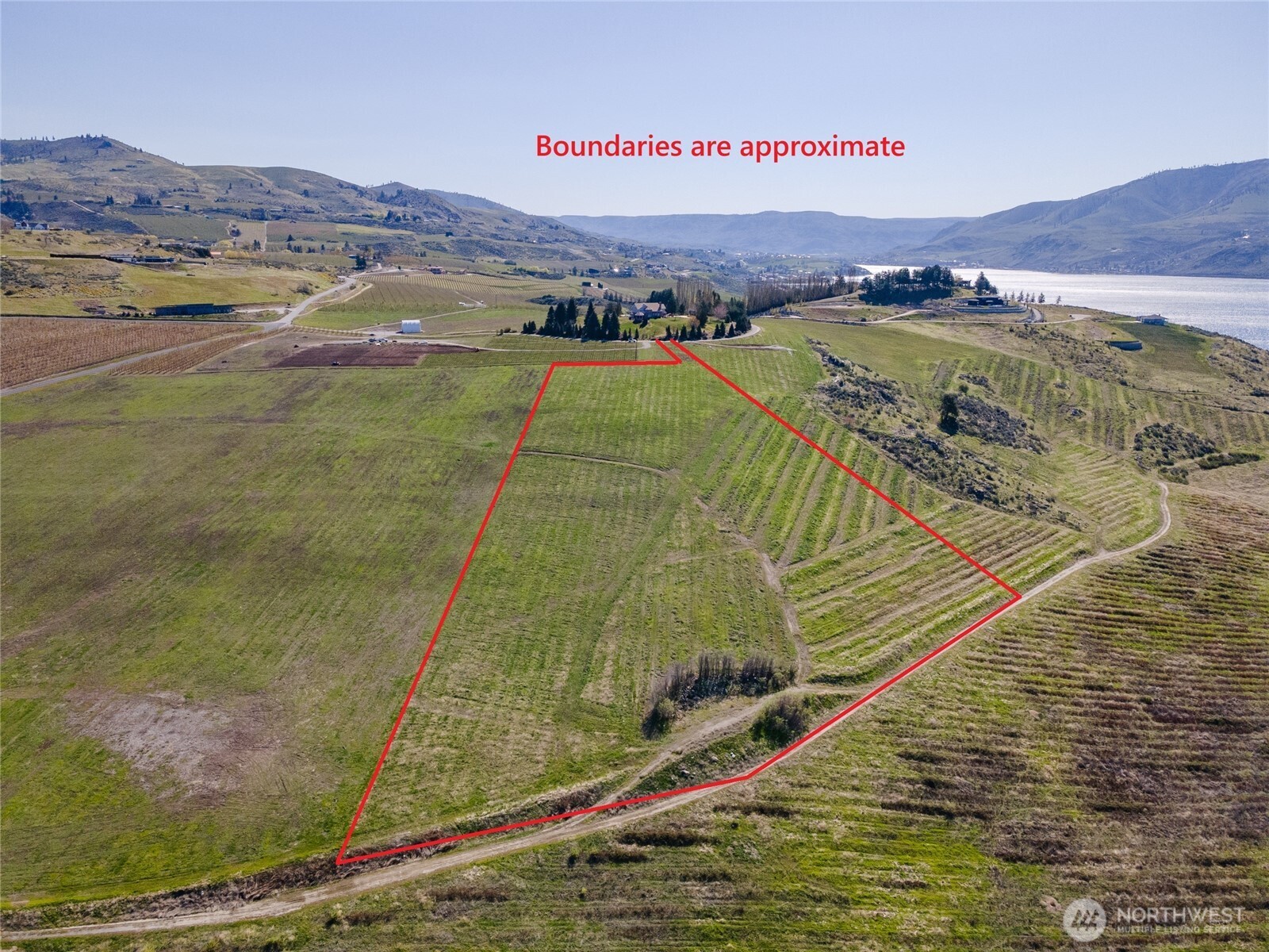 -nna Nna Makai Road Manson, WA 98831 - Photo 13 of 15 a view of a swimming pool with a mountain