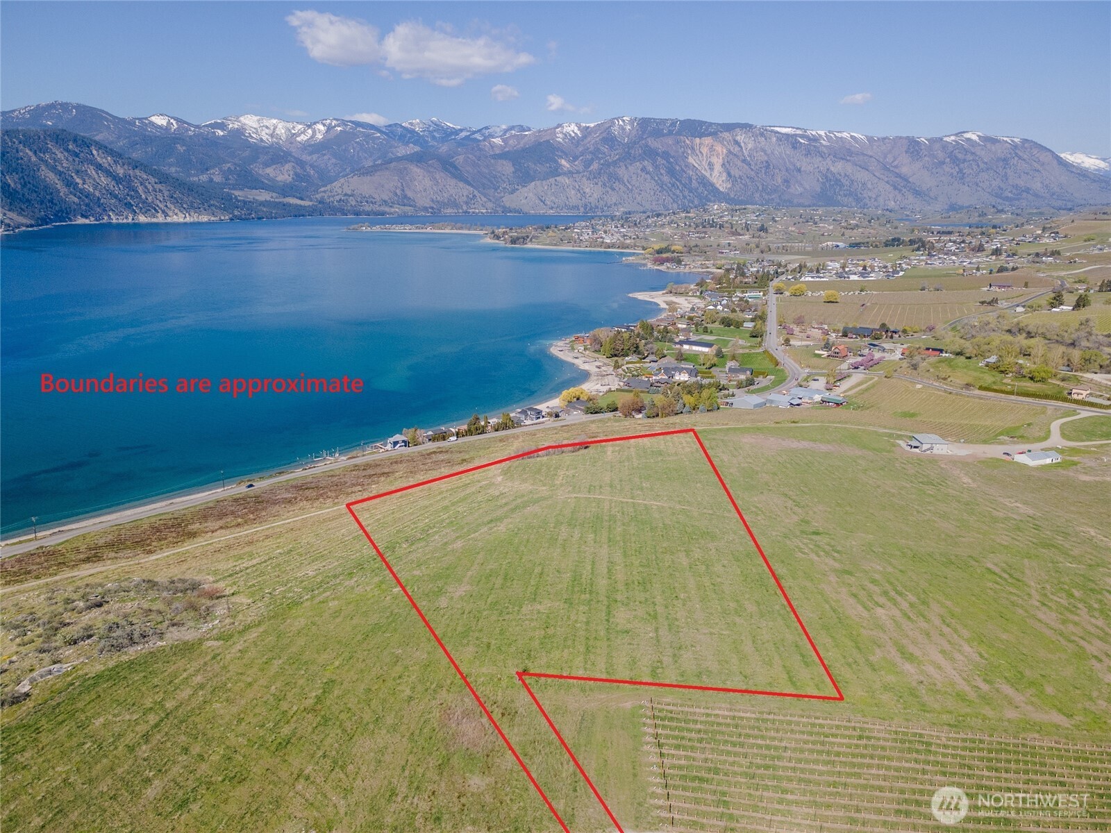 -nna Nna Makai Road Manson, WA 98831 - Photo 14 of 15 a view of a swimming pool with a mountain