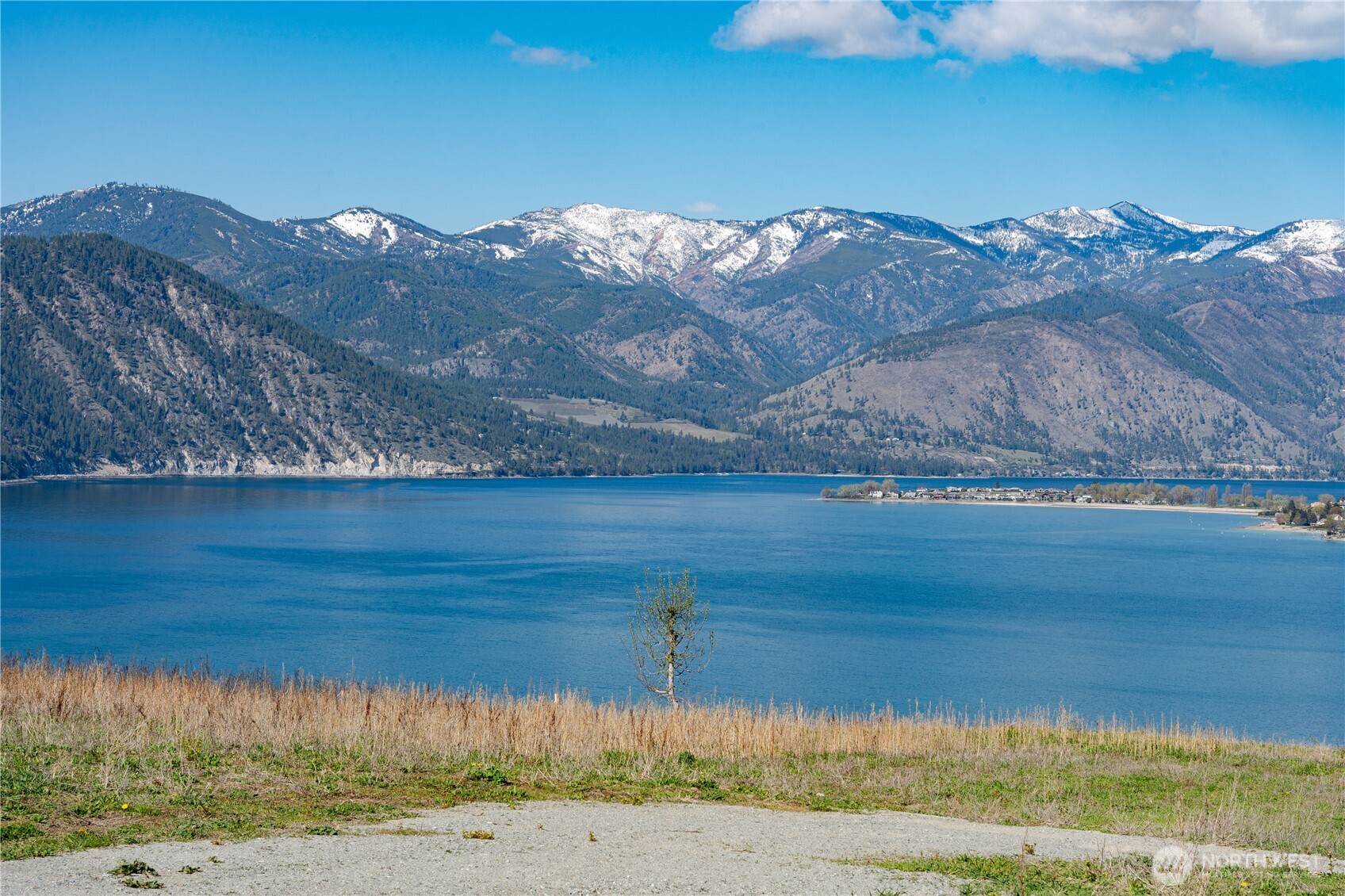 -nna Nna Makai Road Manson, WA 98831 - Photo 2 of 15 a view of a house with a mountain