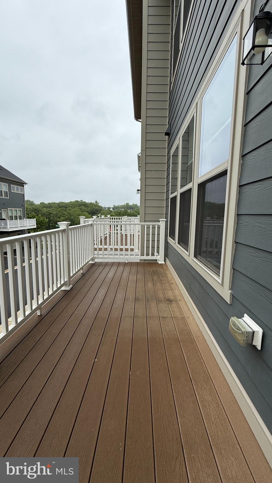 1949 Greenbriar Hall Road Dumfries, VA 22026 - Photo 25 of 26 a view of a balcony with wooden floor