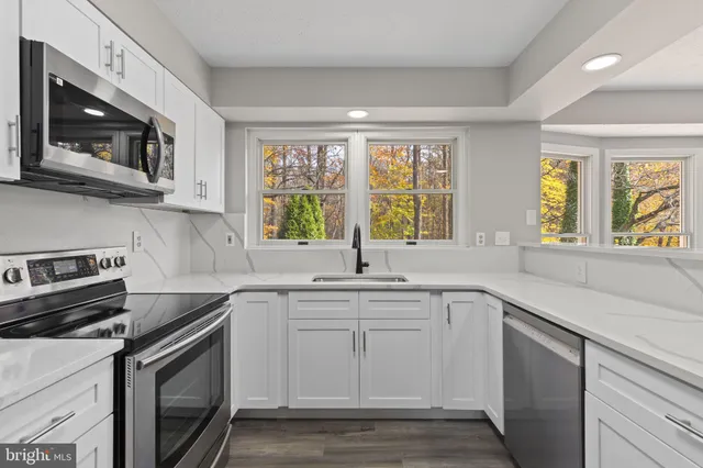 a utility room with washer and dryer