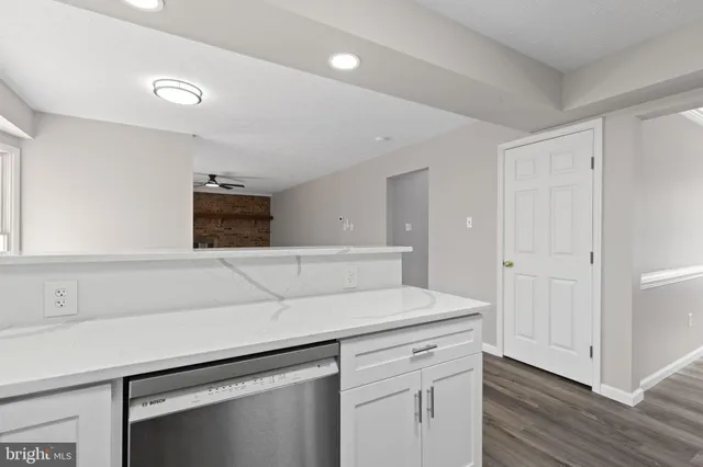 a kitchen with a stove and a microwave