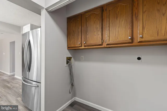 a view of hallway with furniture