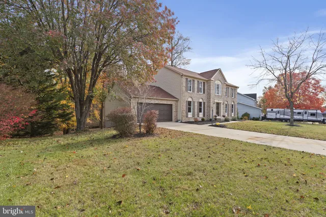 a view of a large building with large trees