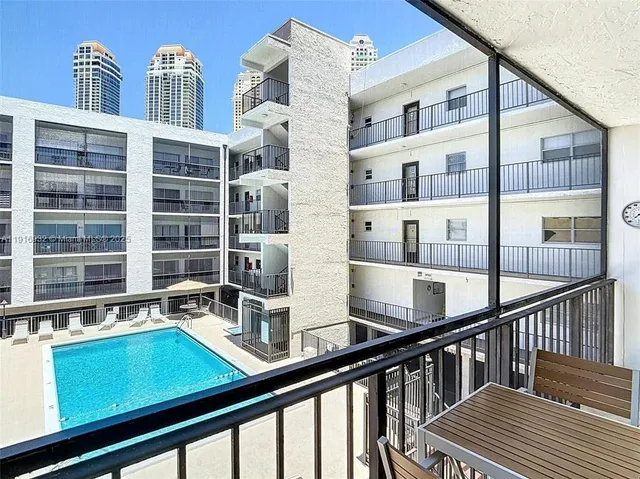 a view of a building from a balcony