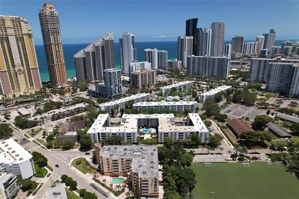 a view of a street with sitting area