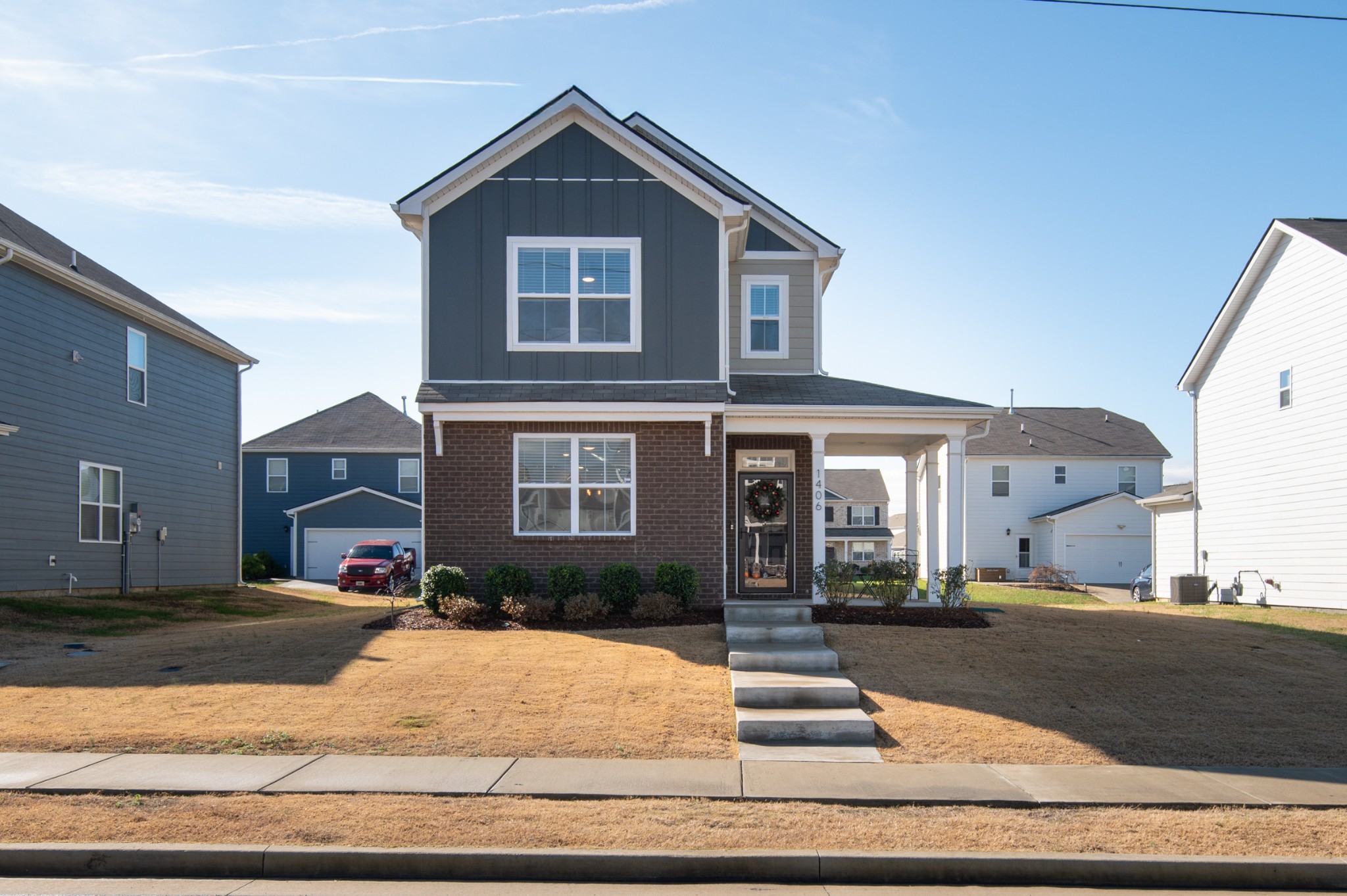 1406 Ashfield Place Lebanon, TN 37087 - Photo 1 of 23 a front view of a house with garage