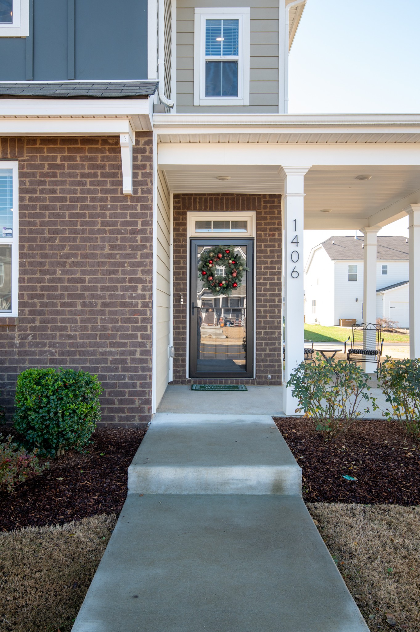 1406 Ashfield Place Lebanon, TN 37087 - Photo 2 of 23 a front view of a house with a yard