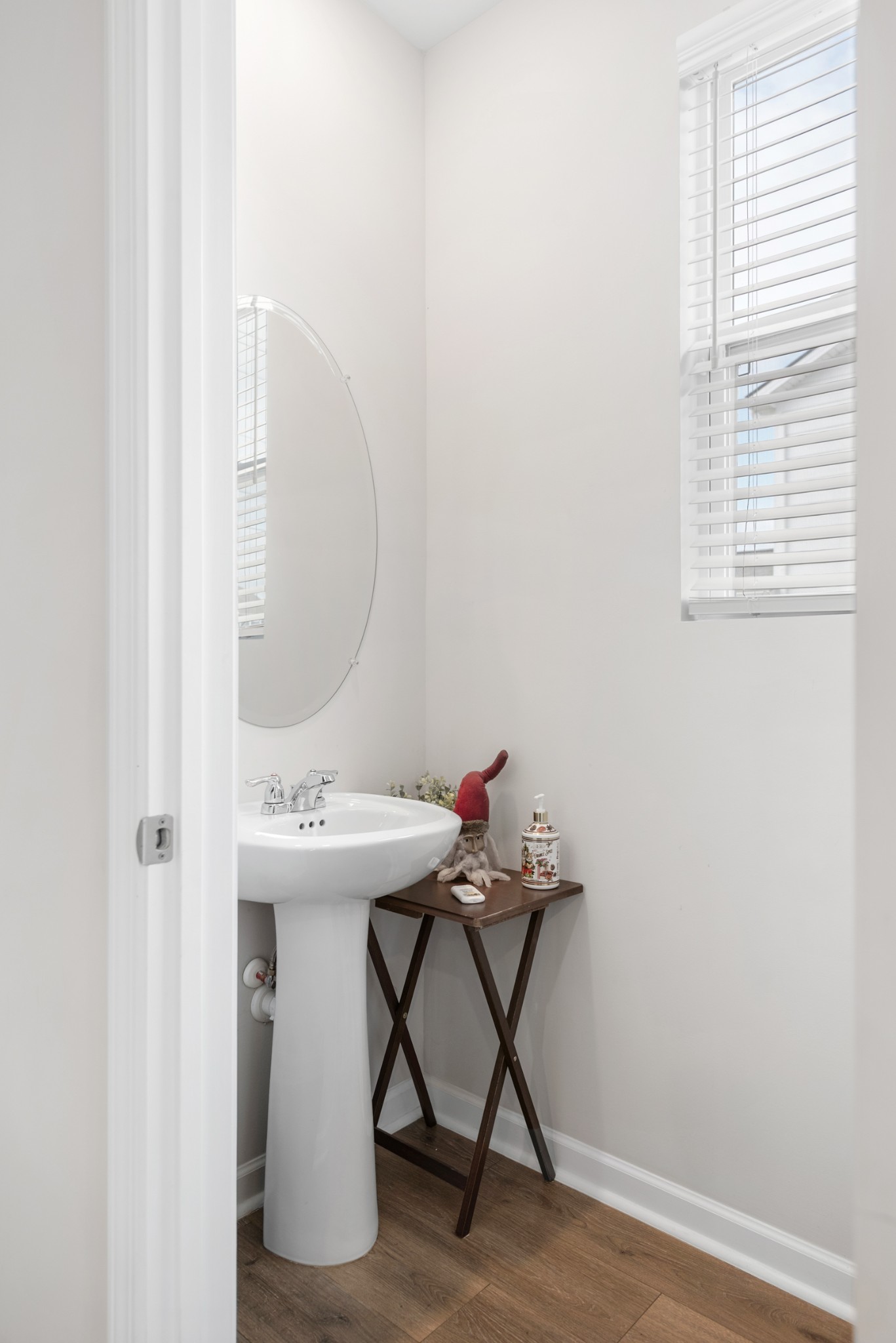 1406 Ashfield Place Lebanon, TN 37087 - Photo 22 of 23 a bathroom with a sink and a mirror