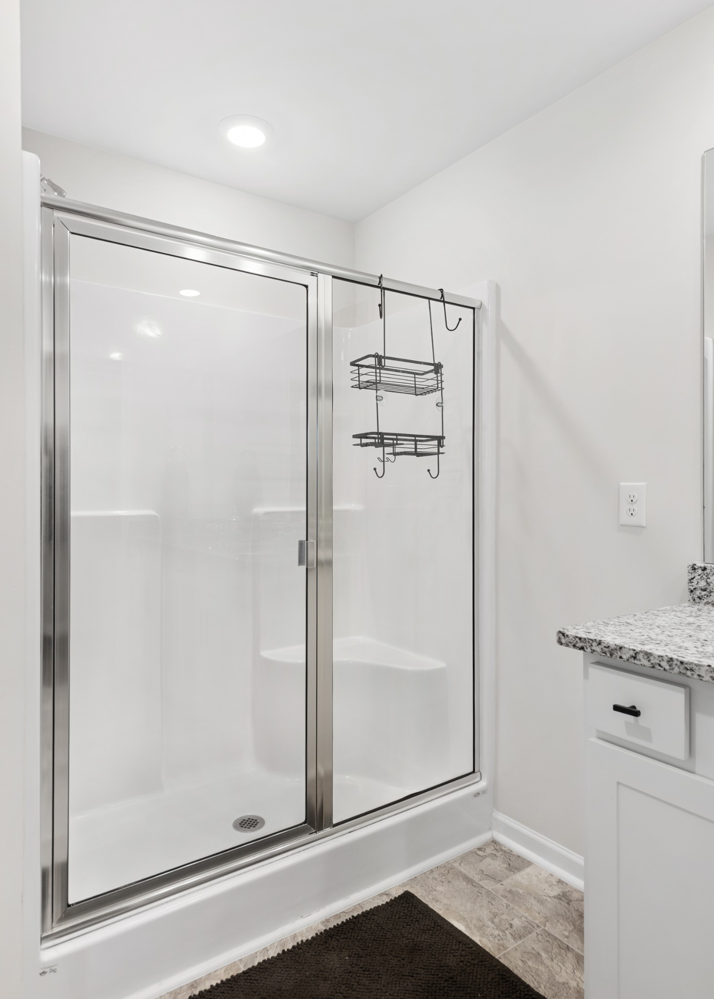1406 Ashfield Place Lebanon, TN 37087 - Photo 23 of 23 a bathroom with a glass shower door