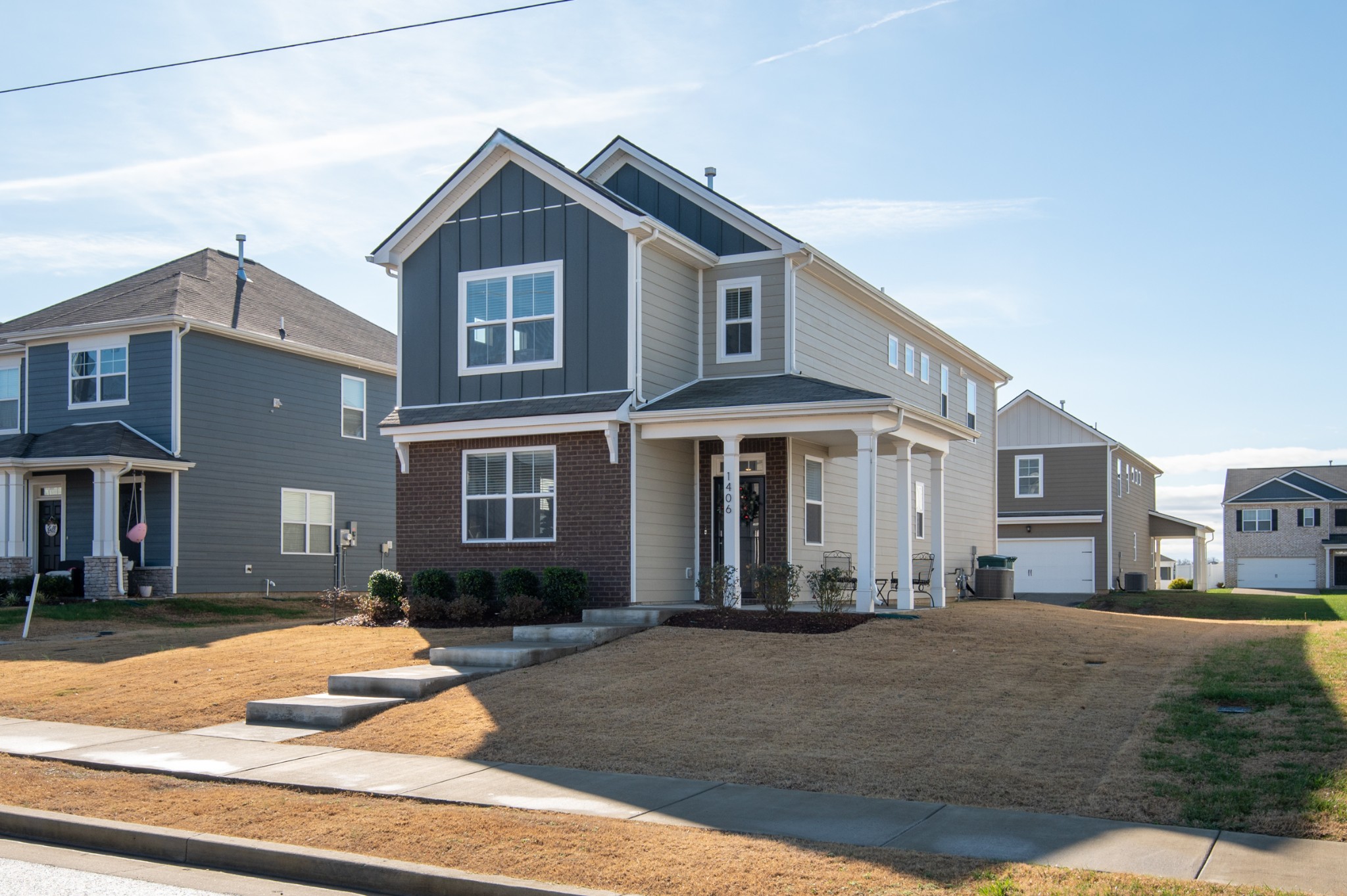 1406 Ashfield Place Lebanon, TN 37087 - Photo 5 of 23 a front view of a house with a yard