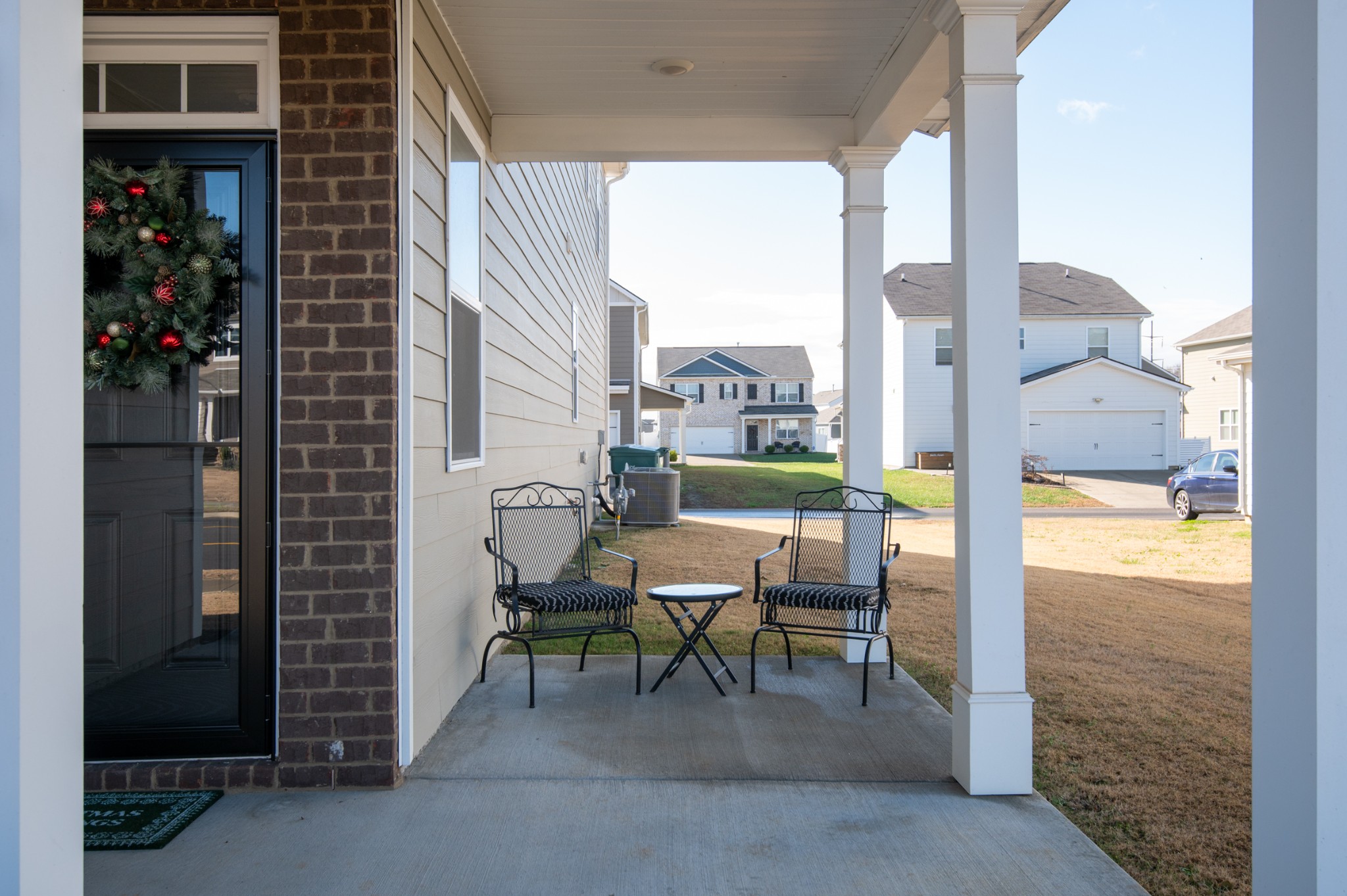 1406 Ashfield Place Lebanon, TN 37087 - Photo 6 of 23 a view of a balcony with chairs and a table