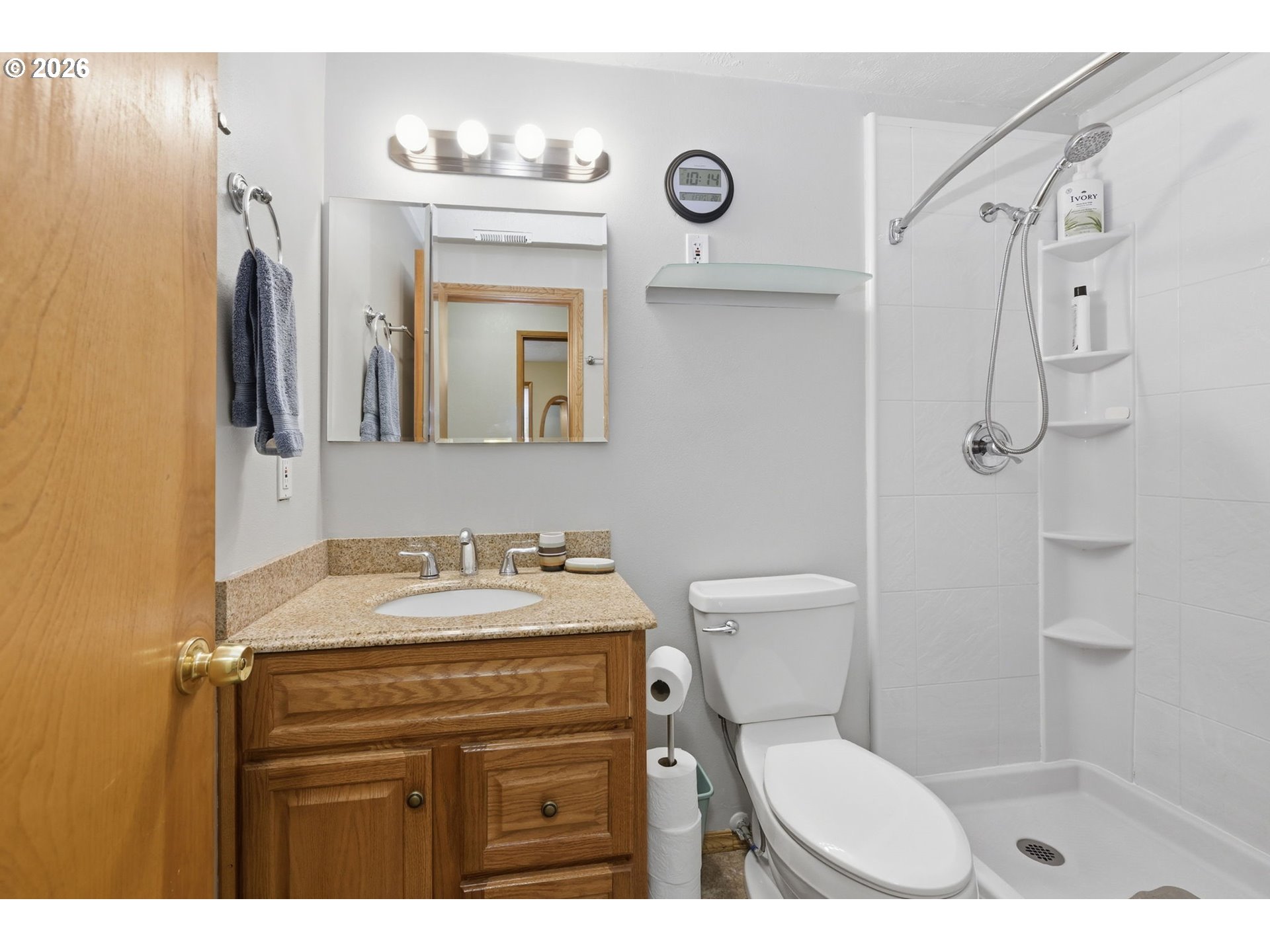 430 South 37th Place Springfield, OR 97478 - Photo 29 of 39 a bathroom with a sink a toilet a mirror and shower
