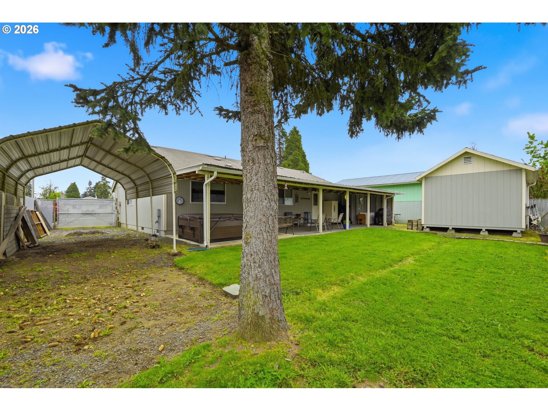 430 South 37th Place Springfield, OR 97478 - Photo 36 of 39 a view of a house with a backyard
