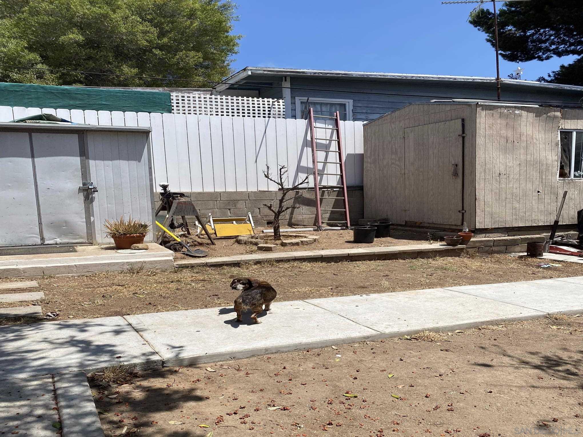 2743 Ridgeway Drive National City, CA 91950 - Photo 13 of 15 a view of a backyard of a house