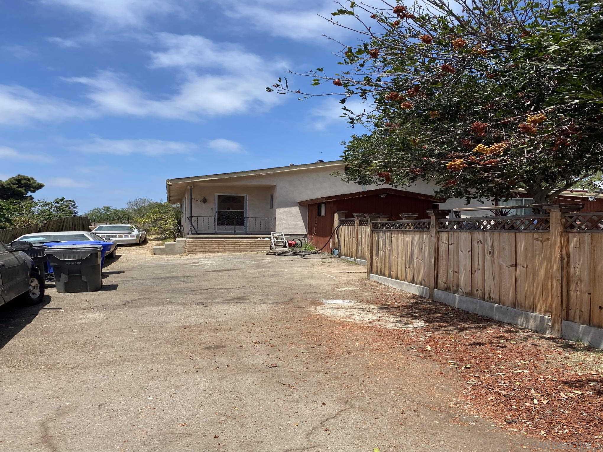 2743 Ridgeway Drive National City, CA 91950 - Photo 3 of 15 a view of a house with backyard and sitting area