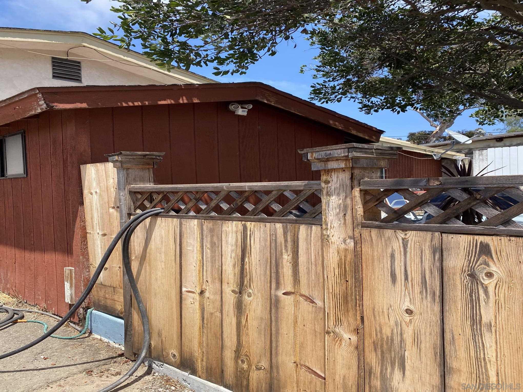2743 Ridgeway Drive National City, CA 91950 - Photo 5 of 15 a view of a house with backyard