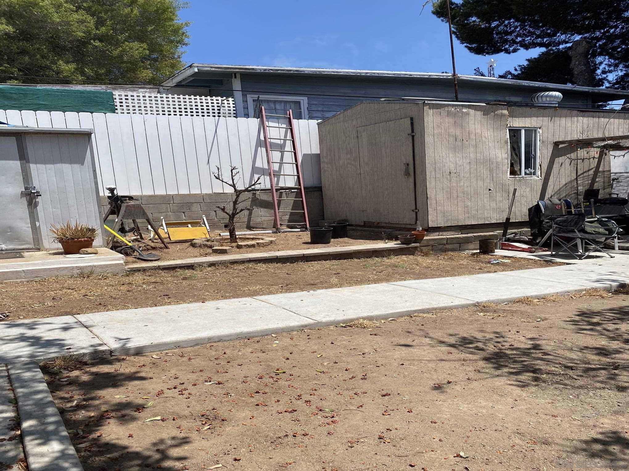 2743 Ridgeway Drive National City, CA 91950 - Photo 9 of 15 a view of a house with a patio