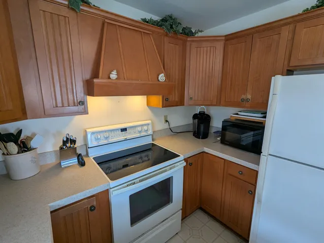 a kitchen with sink and window