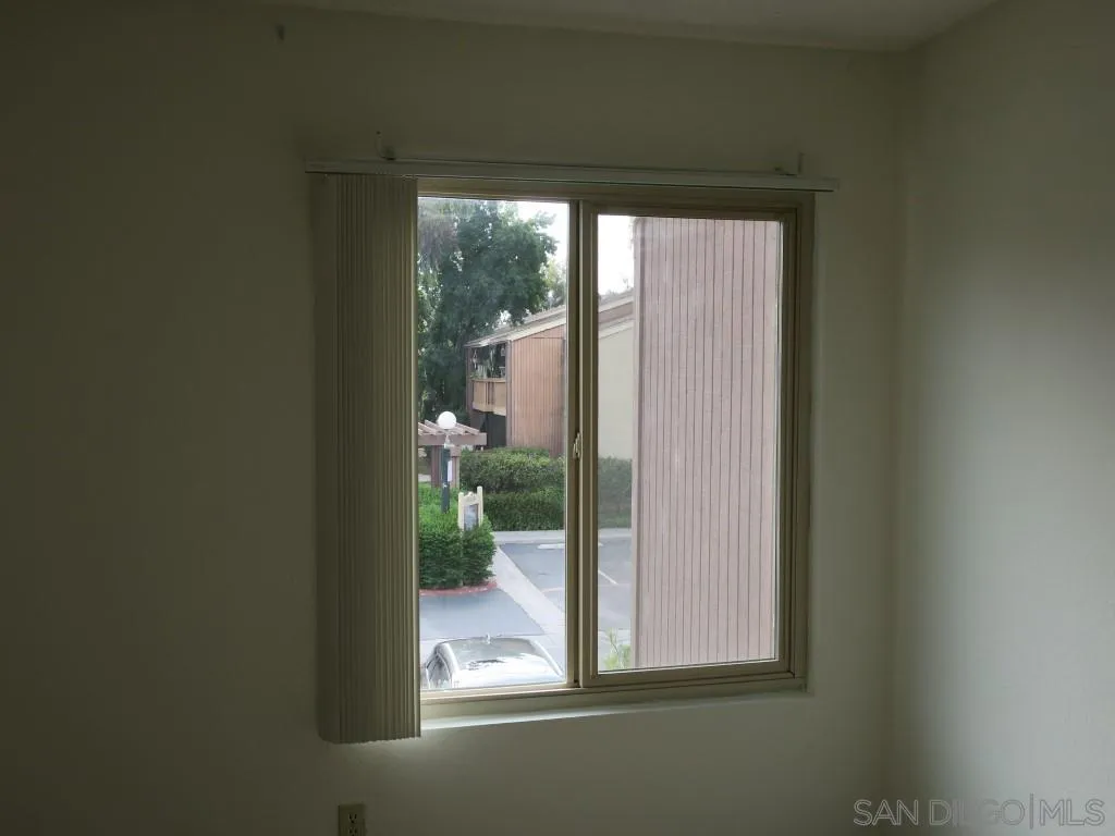 5938 Rancho Mission Road, Unit 134 San Diego, CA 92108 - Photo 15 of 36 a view of a room that has a large window