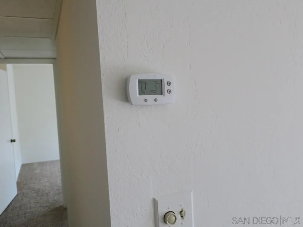 5938 Rancho Mission Road, Unit 134 San Diego, CA 92108 - Photo 17 of 36 a room with a door
