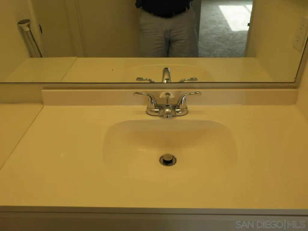 5938 Rancho Mission Road, Unit 134 San Diego, CA 92108 - Photo 21 of 36 a bathroom with a sink