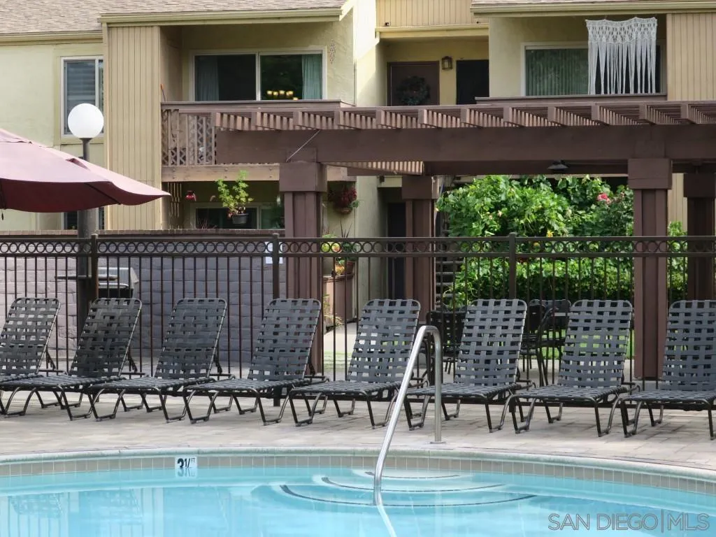5938 Rancho Mission Road, Unit 134 San Diego, CA 92108 - Photo 31 of 36 a view of house with a patio