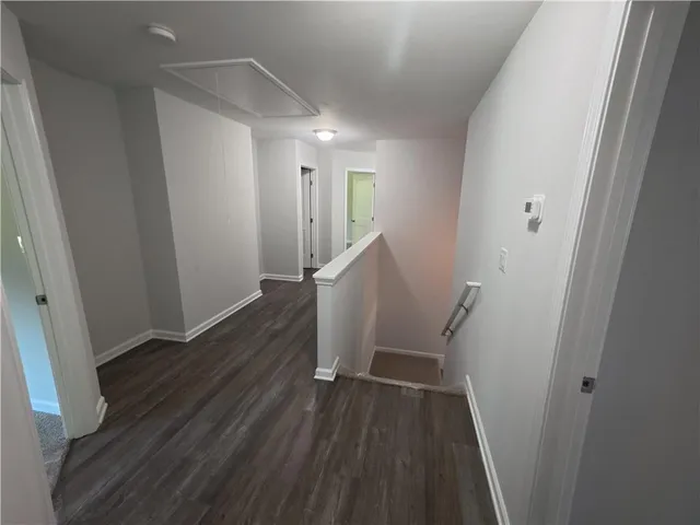 a view of entryway with wooden floor