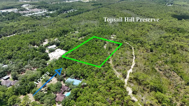 a view of a city with mountains in the background