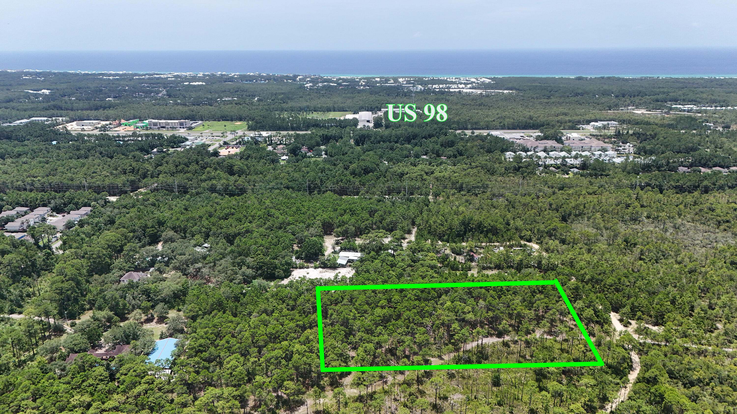 461 Don Bishop Road Santa Rosa Beach, FL 32459 - Photo 3 of 17 a view of a city with mountains in the background