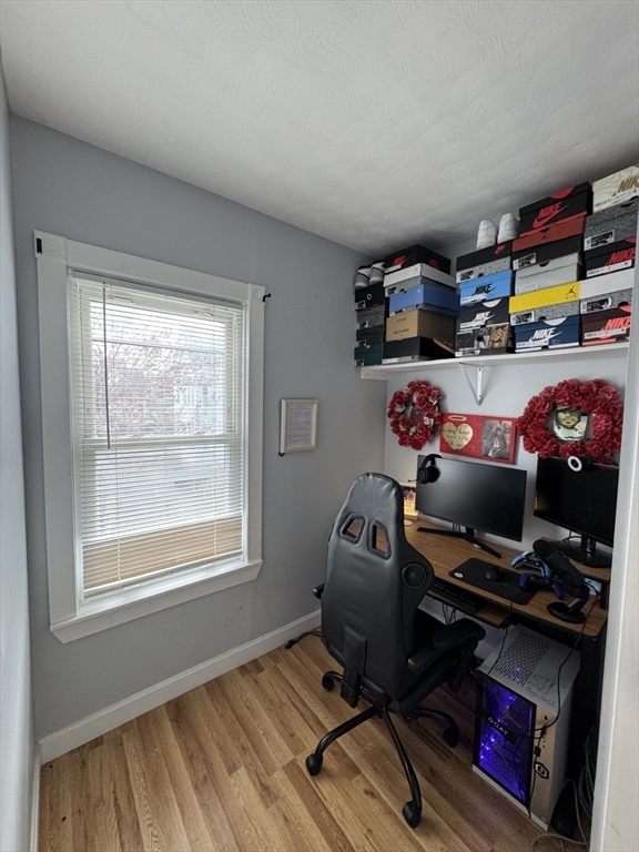 100 Bonney Street New Bedford, MA 02740 - Photo 15 of 23 a bedroom with furniture and a window