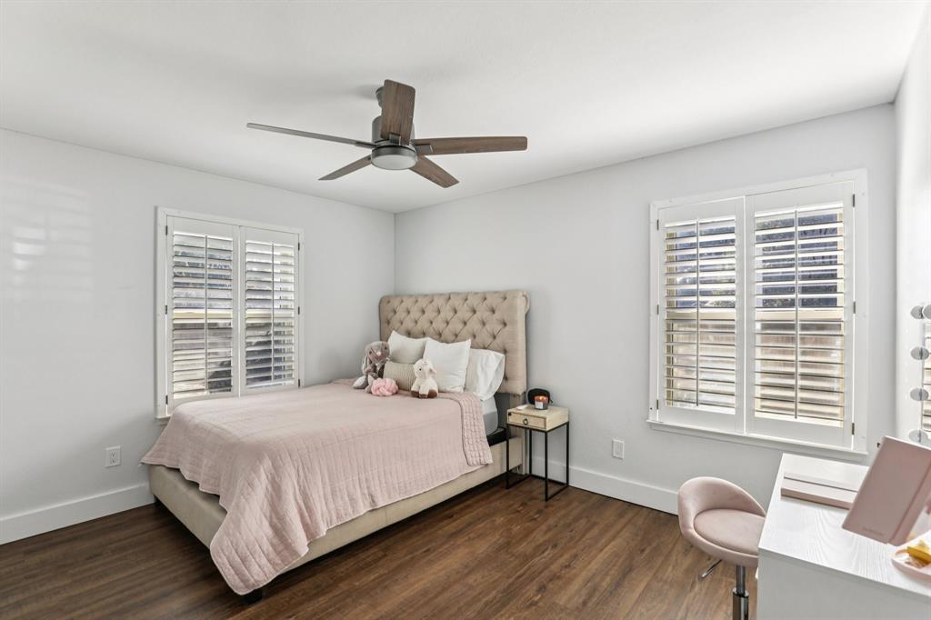 6667 Silver Saddle Road Fort Worth, TX 76126 - Photo 19 of 35 a bedroom with a bed and a window