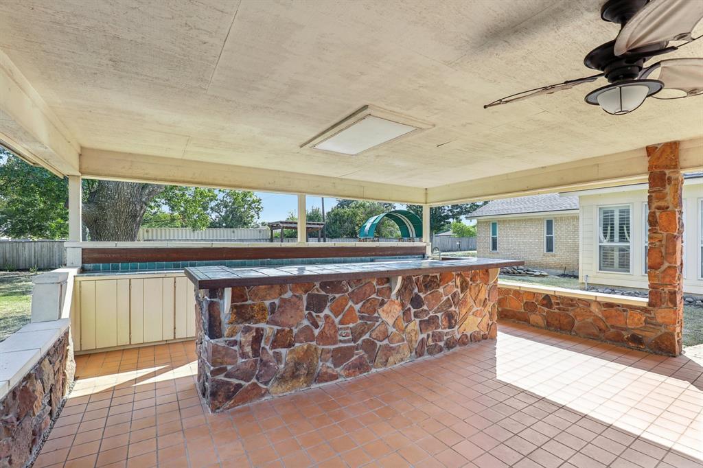 6667 Silver Saddle Road Fort Worth, TX 76126 - Photo 31 of 35 a view of a two chair in the balcony