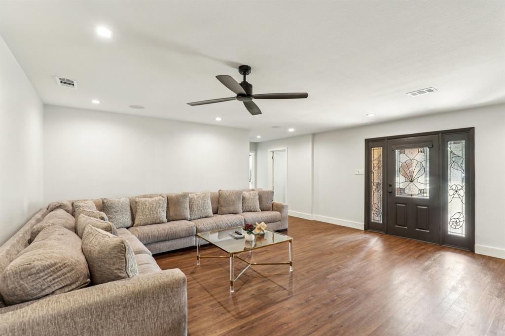 6667 Silver Saddle Road Fort Worth, TX 76126 - Photo 6 of 35 a living room with furniture and a window