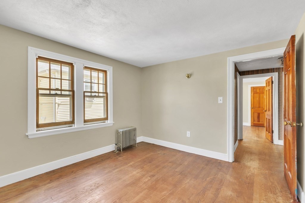 61 Beauregard Street Springfield, MA 01151 - Photo 16 of 24 an empty room with windows and closet