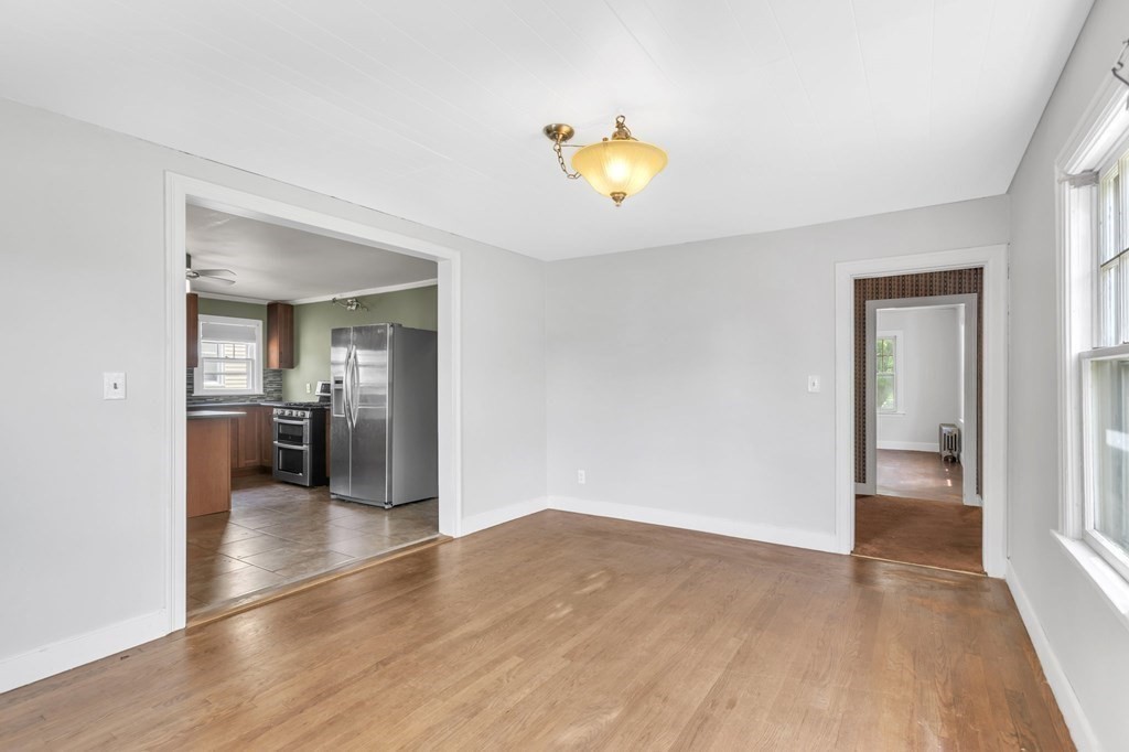 61 Beauregard Street Springfield, MA 01151 - Photo 5 of 24 a view of a kitchen cabinets and wooden floor