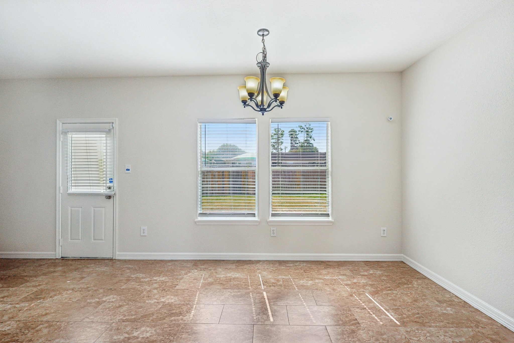 4822 East Fairfax Village Circle Spring, TX 77373 - Photo 4 of 24 a view of an empty room with a window