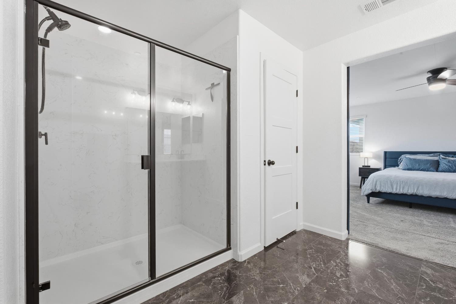 7240 Encore Way Roseville, CA 95747 - Photo 33 of 52 a view of bedroom with a glass door and shower