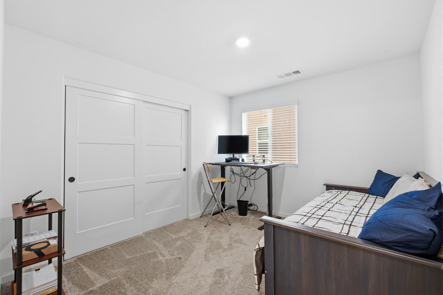 7240 Encore Way Roseville, CA 95747 - Photo 36 of 52 a bedroom with a bed and a television