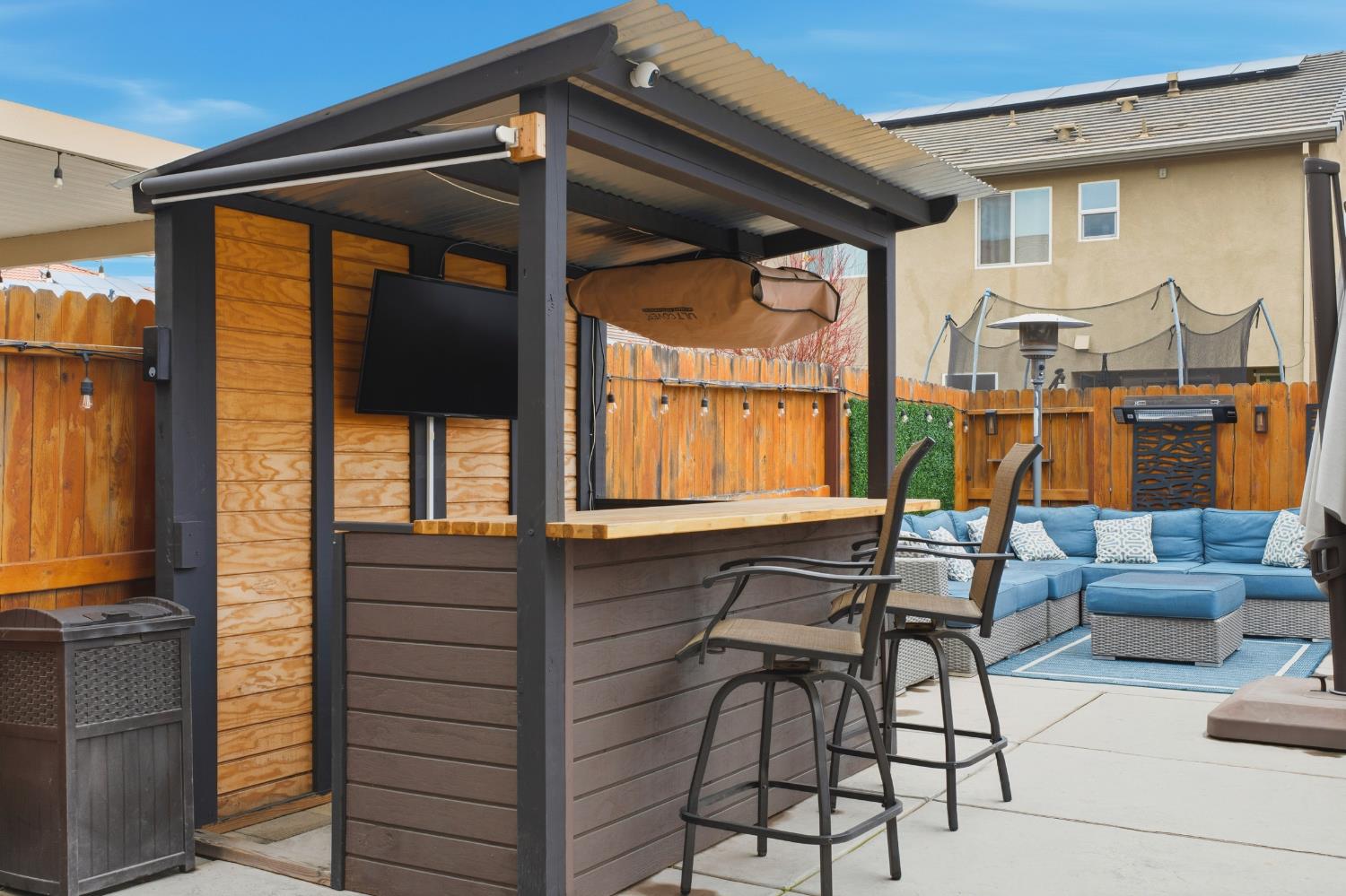 7240 Encore Way Roseville, CA 95747 - Photo 40 of 52 a view of a patio with couches chairs and potted plants