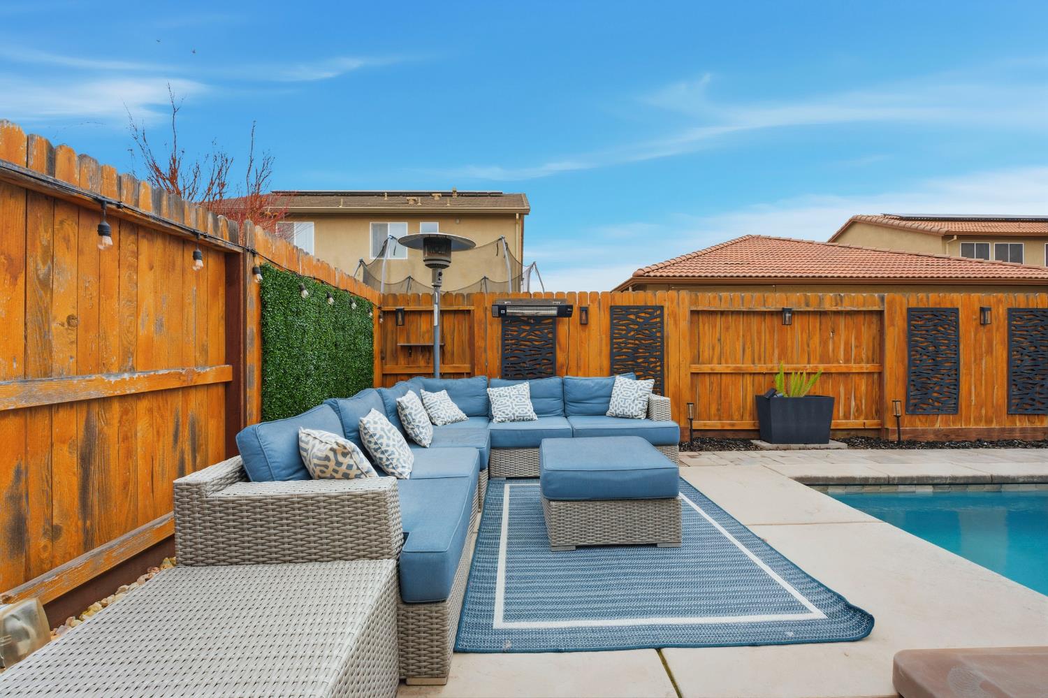 7240 Encore Way Roseville, CA 95747 - Photo 44 of 52 a view of a patio with couches and pool