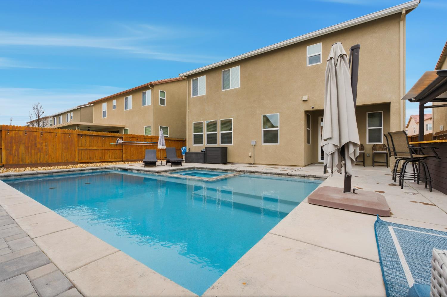7240 Encore Way Roseville, CA 95747 - Photo 46 of 52 a view of swimming pool with outdoor seating
